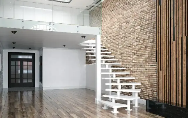 Piso vacío y limpio con escalera, listo para la entrega de llaves